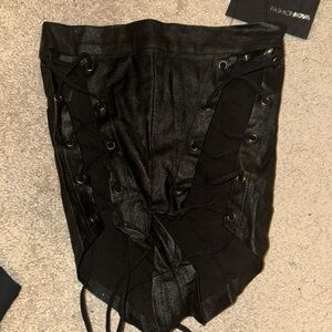 Leatherette tie front mini shorts